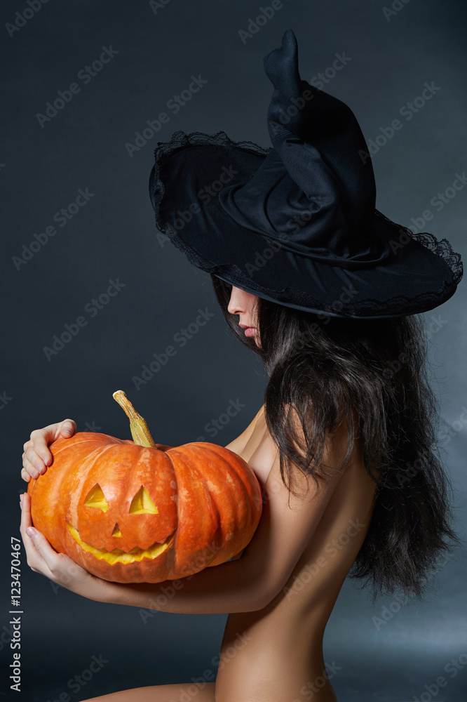 halloween sexy witch girl with pumpkin Stock Photo | Adobe Stock