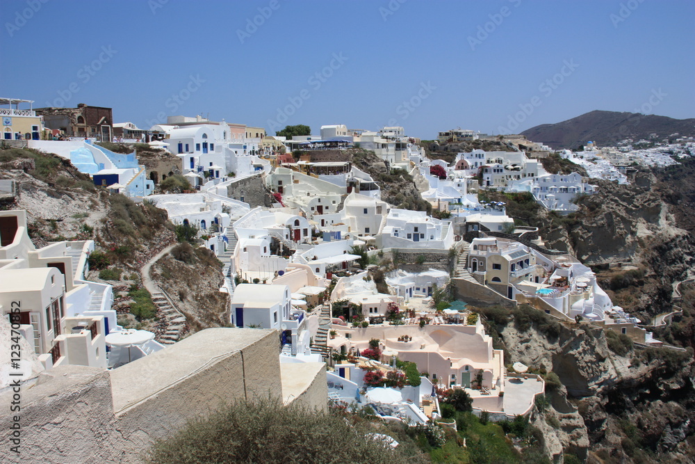 White houses with blue roofs in Santorini. Greece