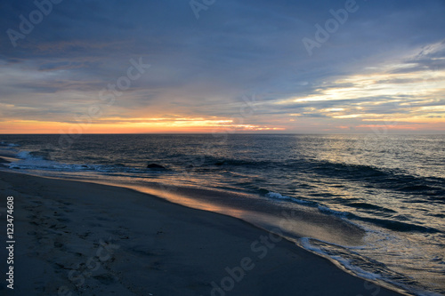 Fototapeta Naklejka Na Ścianę i Meble -  Tranquil Summer Sunrise at the Shore