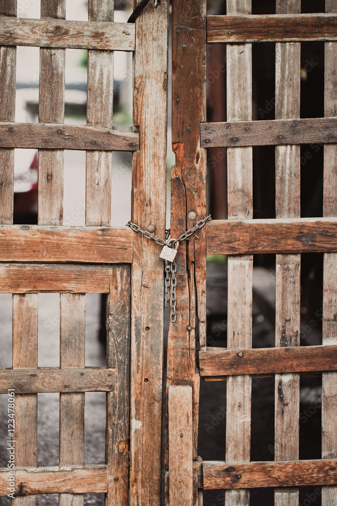 chain lock old wood door closed.