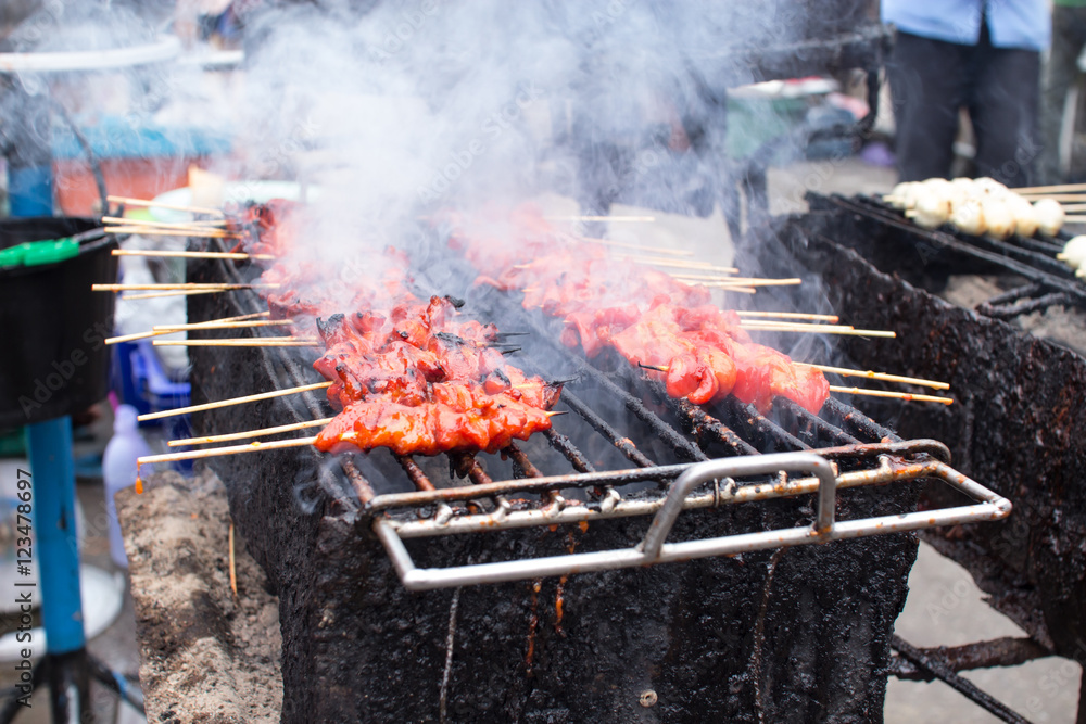 smoky pork grill, meat cooked at high temperatures danger food and cancer risk from Heterocyclic amines (HCAs) and polycyclic aromatic hydrocarbons (PAHs) smoky pork grill, meat cooked at high temperatures danger food and cancer risk from Heterocyclic amines (HCAs) and polycyclic aromatic hydrocarbons (PAHs)