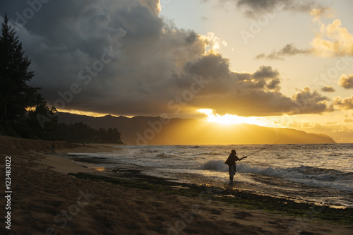 Fisherman at sunset, Oahu, Honolulu, Hawaii, United States of America 
