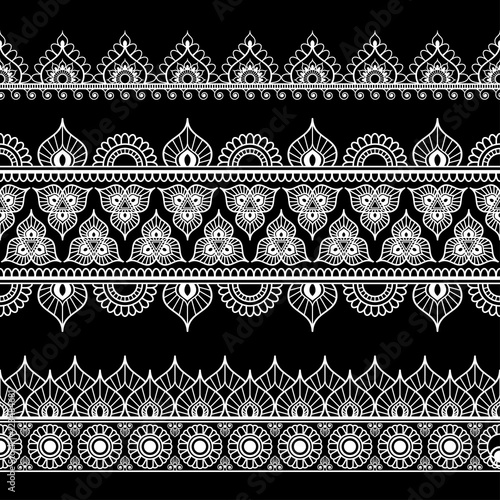 Border line lace mehndi elements in Indian style for card and tattoo isolated on black background.