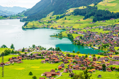 Beautiful rural landscape view on the green mountains and village in Switzerland
