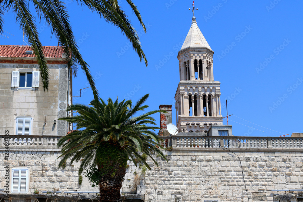 Saint Domnius bell tower is landmark in Split, Croatia. View from Riva promenade. Split is popular touristic destination and UNESCO World Heritage Site.