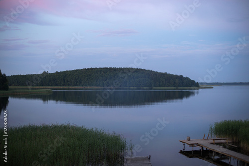 sunrise over a lake with island misty morning