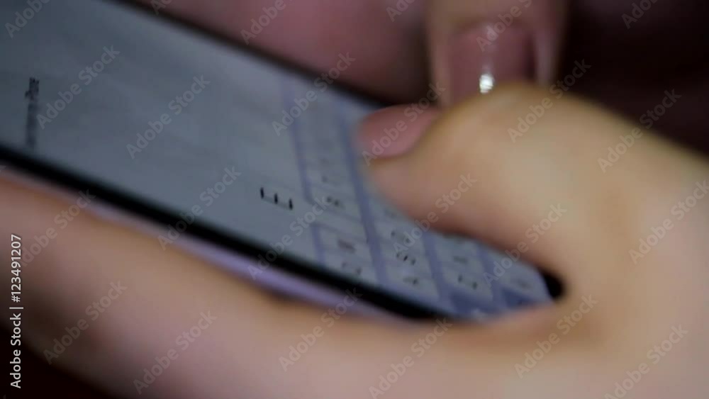 Woman Fingers Writing A Message On A Smart Phone, E-mail, Communication, Detail Woman Fingers Writing A Message On A Smart Phone, E-mail, Communication, Detail