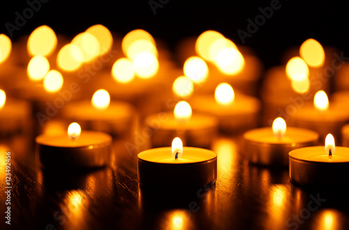 Many burning candles with shallow depth of field © vladstar