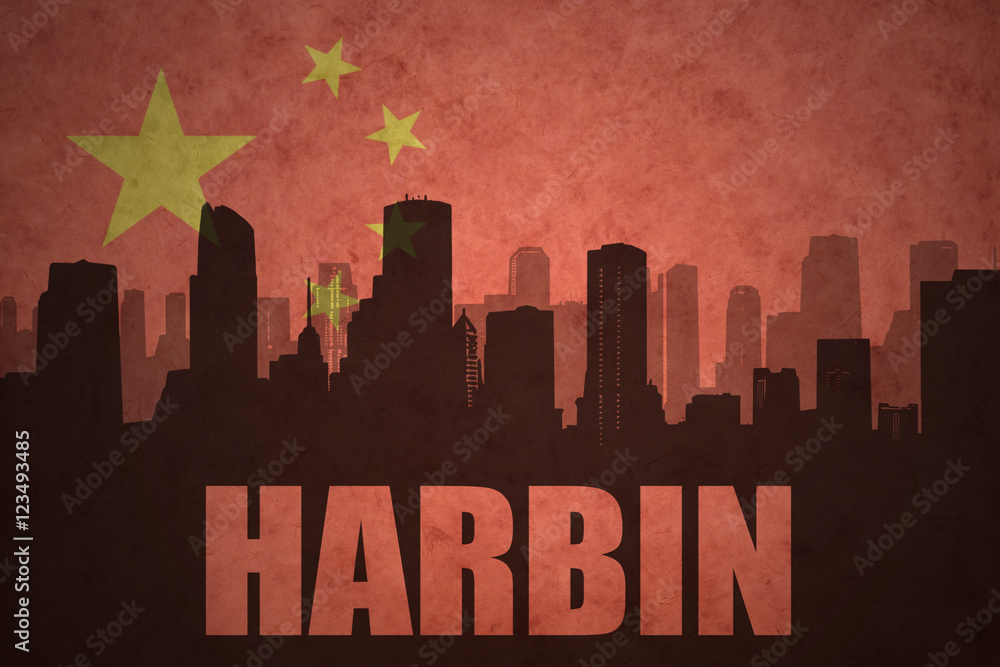 abstract silhouette of the city with text Harbin at the vintage chinese flag background