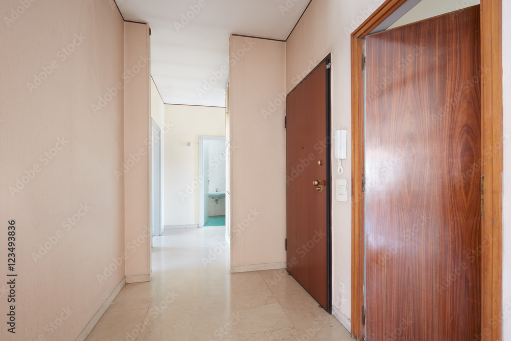 Corridor in empty apartment with marble floor, perspective
