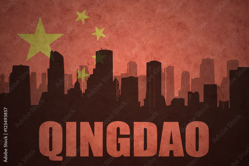 abstract silhouette of the city with text Qingdao at the vintage chinese flag background