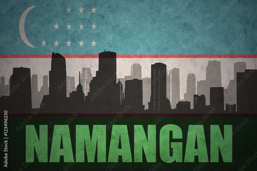 abstract silhouette of the city with text Namangan at the vintage uzbekistan flag background