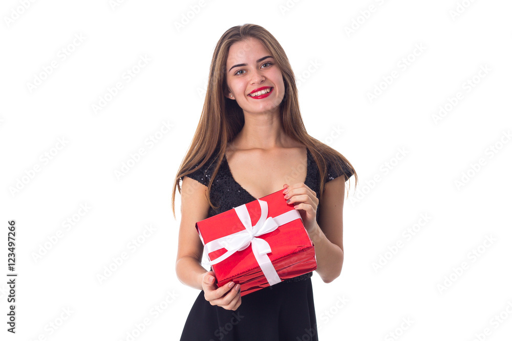 Fototapeta premium Young woman holding a present