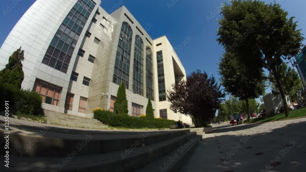 Business Building In Bucharest, People Passing By, Modern Architecture, Pan Business Building In Bucharest, People Passing By, Modern Architecture, Pan