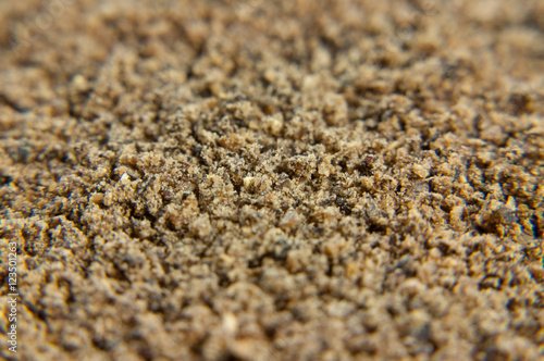 The texture of ground black pepper