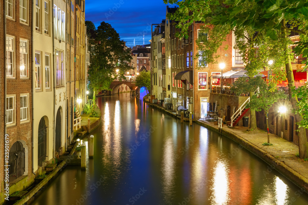 Canal Oudegracht in the night colorful illuminations in the blue hour, Utrecht, Netherlands
