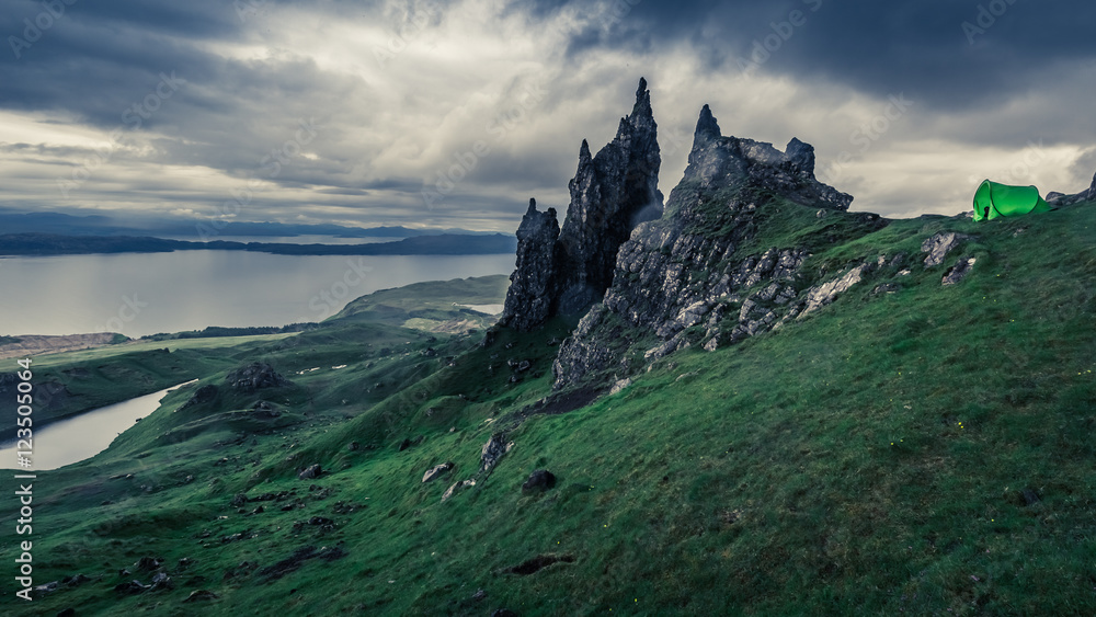 Stormy clouds over tent in Old Man of Storr, Scotland
