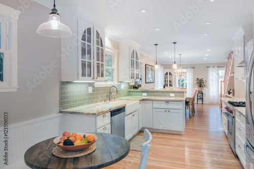 Kitchen with breakfast table and dining area.