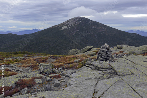 Mount Marcy in the Adirondacks, a 46er and high point in New York State as viewed from the summit of Skylight Mountain showing autumn colors of the subarctic alpine vegetation photo