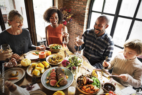 People Celebrating Thanksgiving Holiday Tradition Concept