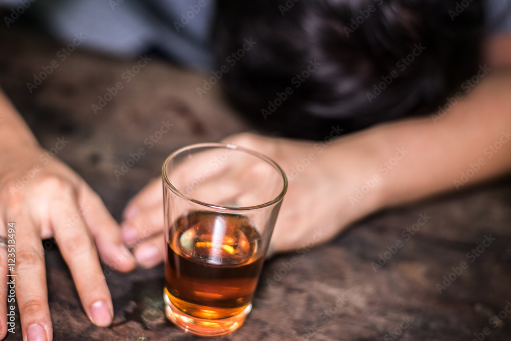 drunk man with a glass of brandy. drunk man with a glass of brandy.