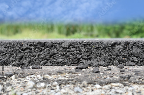 layer of asphalt raw material in a shallow dept of field
