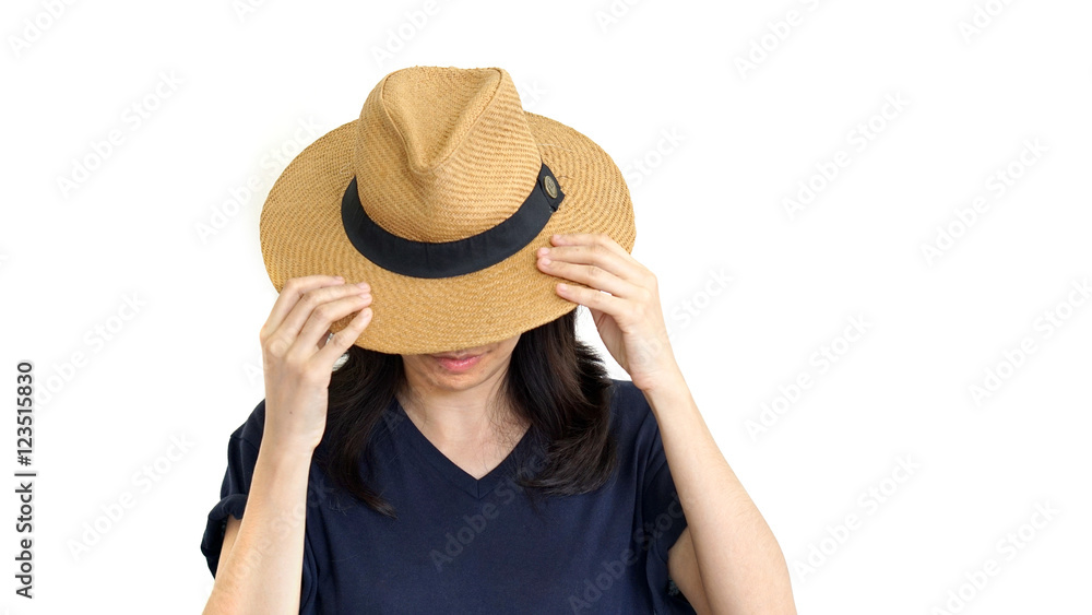 Casual South East Asian girl wearing hat hiding face Casual South East Asian girl wearing hat hiding face
