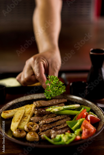 Assorted delicious grilled meat with vegetables