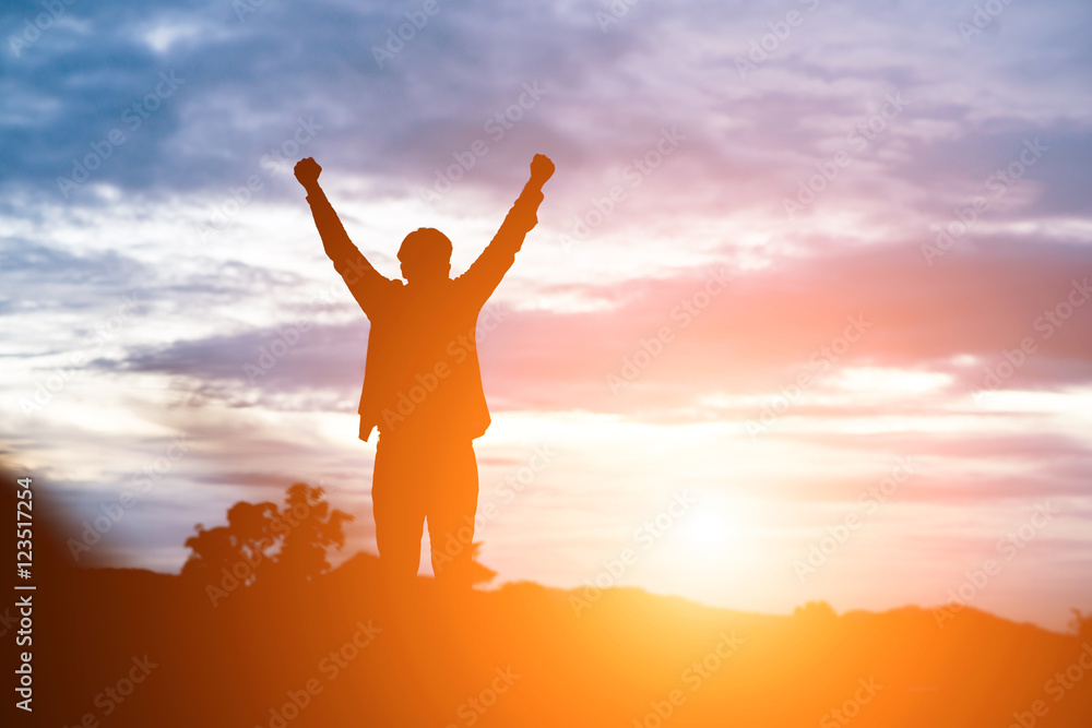 Raised arms man against beautiful sunset. Raised arms man against beautiful sunset.