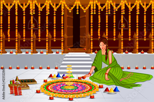 Indian lady with decorated hanging light for Happy Diwali