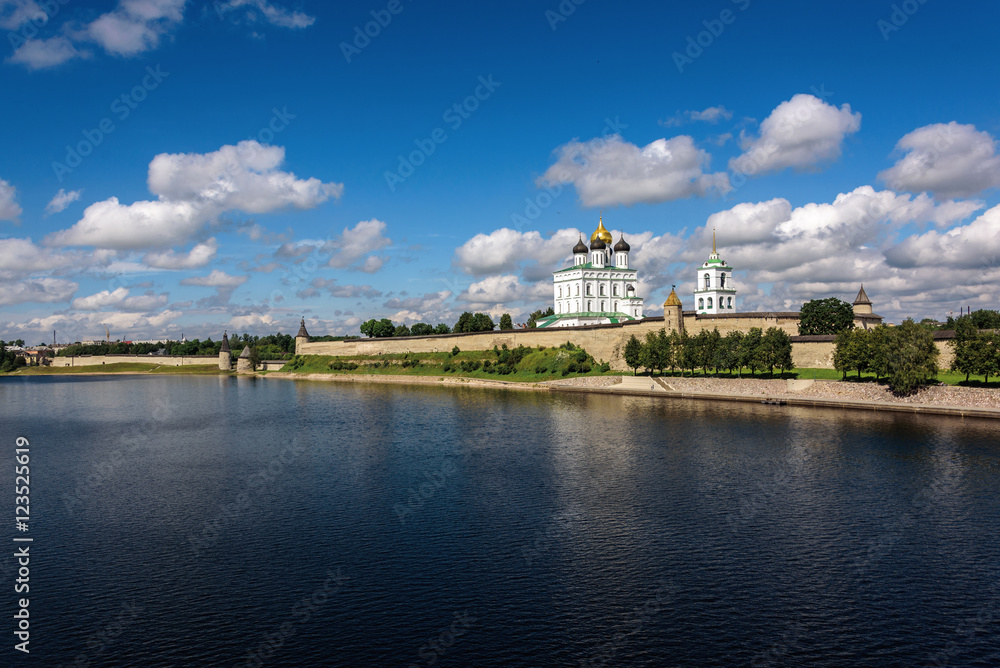 View of the Pskov Kremlin from Velikaya River in the summer in a sunny weather