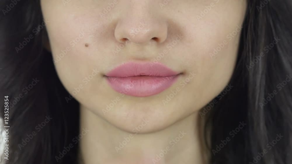 Lips Close Up, Gesture of Silence, Fingers on Lips Lips Close Up, Gesture of Silence, Fingers on Lips