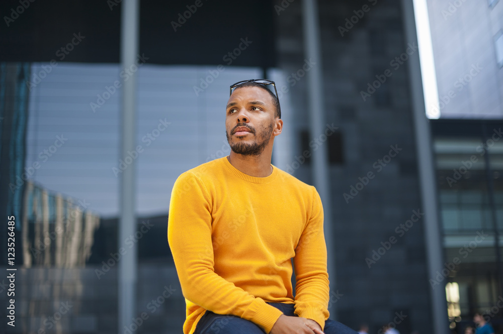 Portrait of man wearing yellow pullover Portrait of man wearing yellow pullover