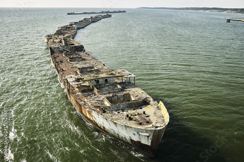 USA, Aerial photograph of sunken ships forming a bulkhead along the Eastern Shore of Virginia shoreline of the Chesapeake Bay