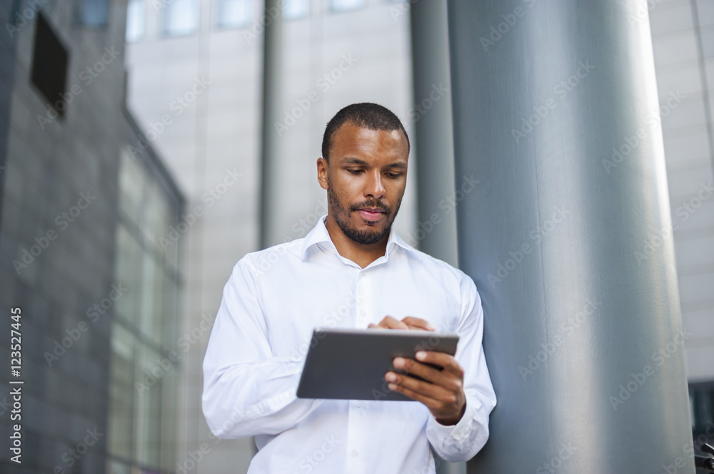 Businessman using tablet