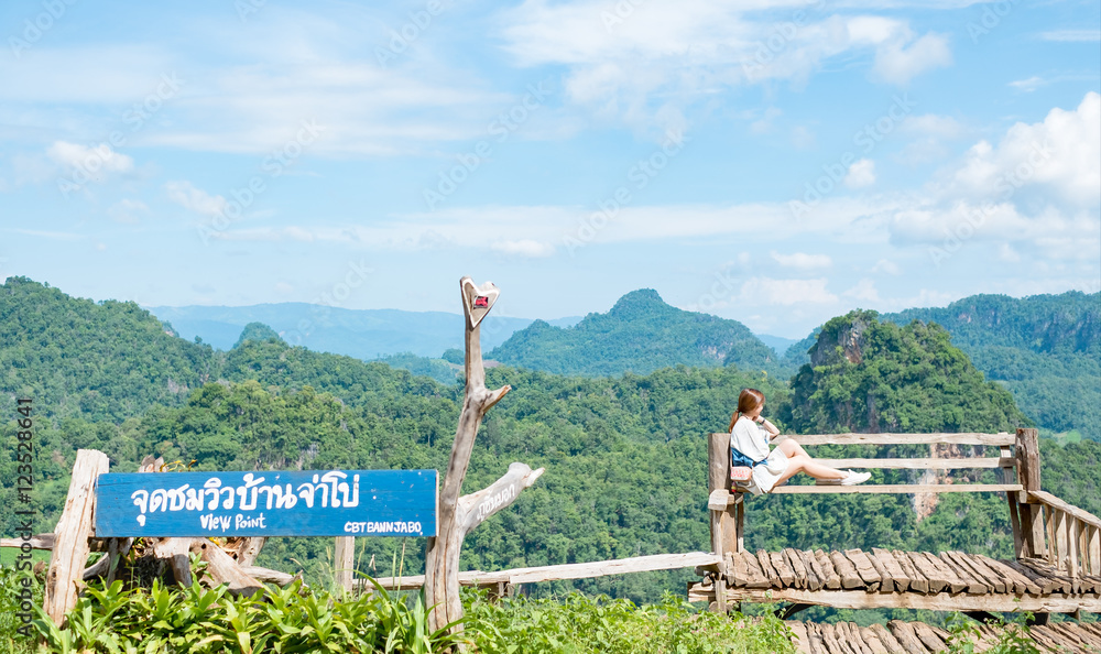 Fototapeta premium Asian woman at viewpoint 