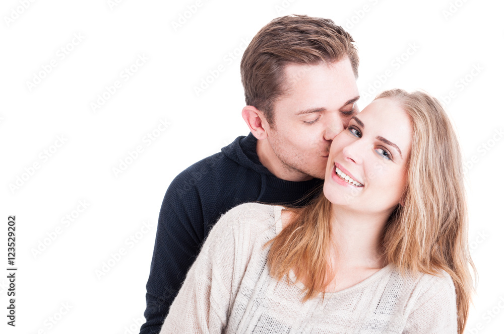 Man kissing on cheek her beautiful lady