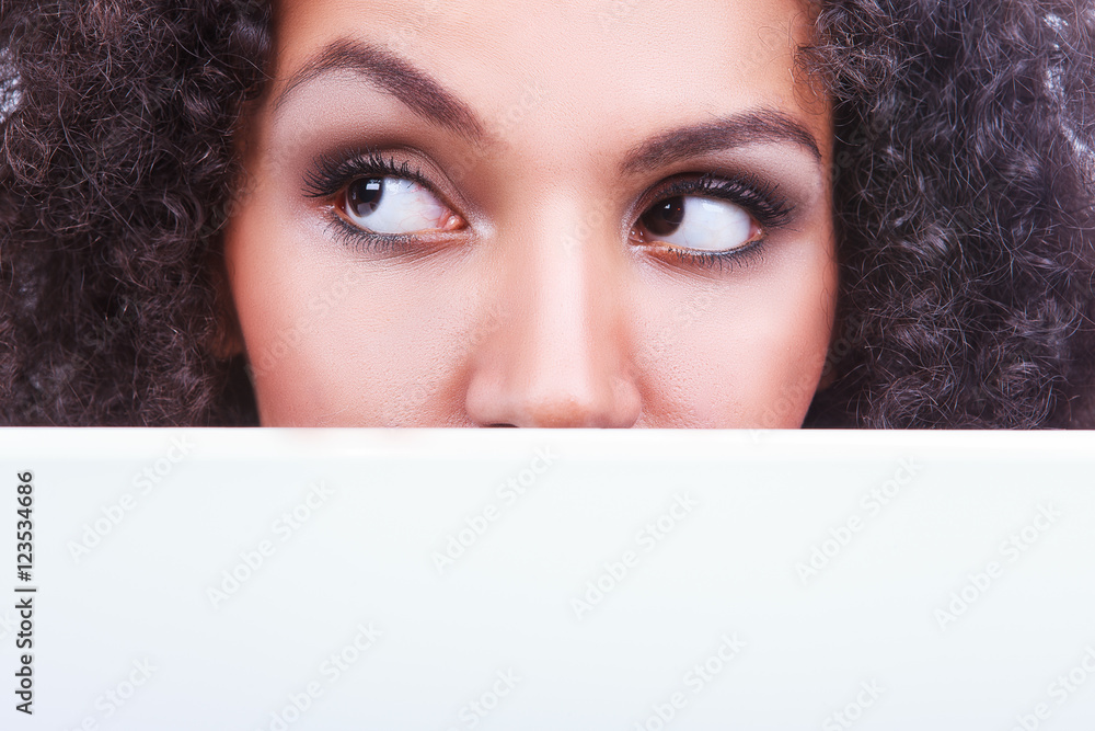 Portrait of a beautiful young black girl with laptop running Portrait of a beautiful young black girl with laptop running