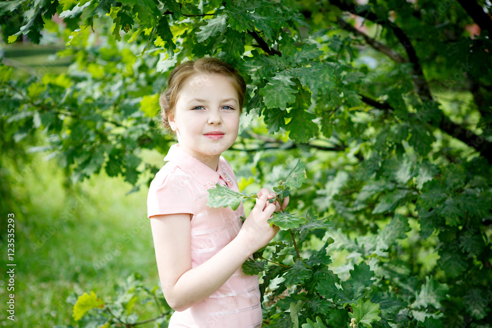 Portrait of beautiful little girl in forest Park Portrait of beautiful little girl in forest Park
