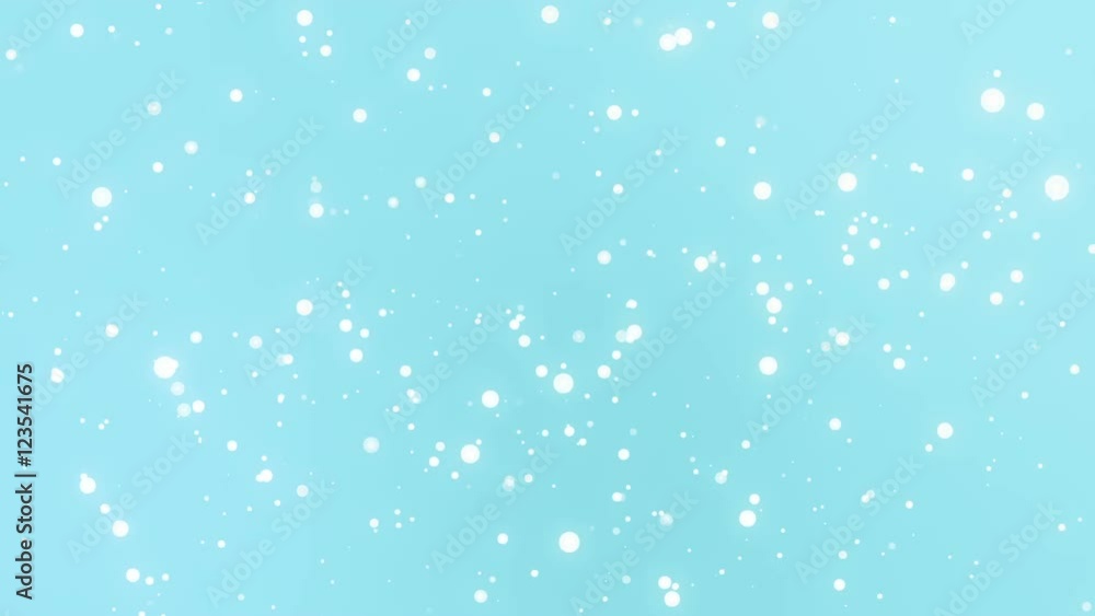 Glowing white snowflake particles falling down against a light teal blue gradient background. Glowing white snowflake particles falling down against a light teal blue gradient background.