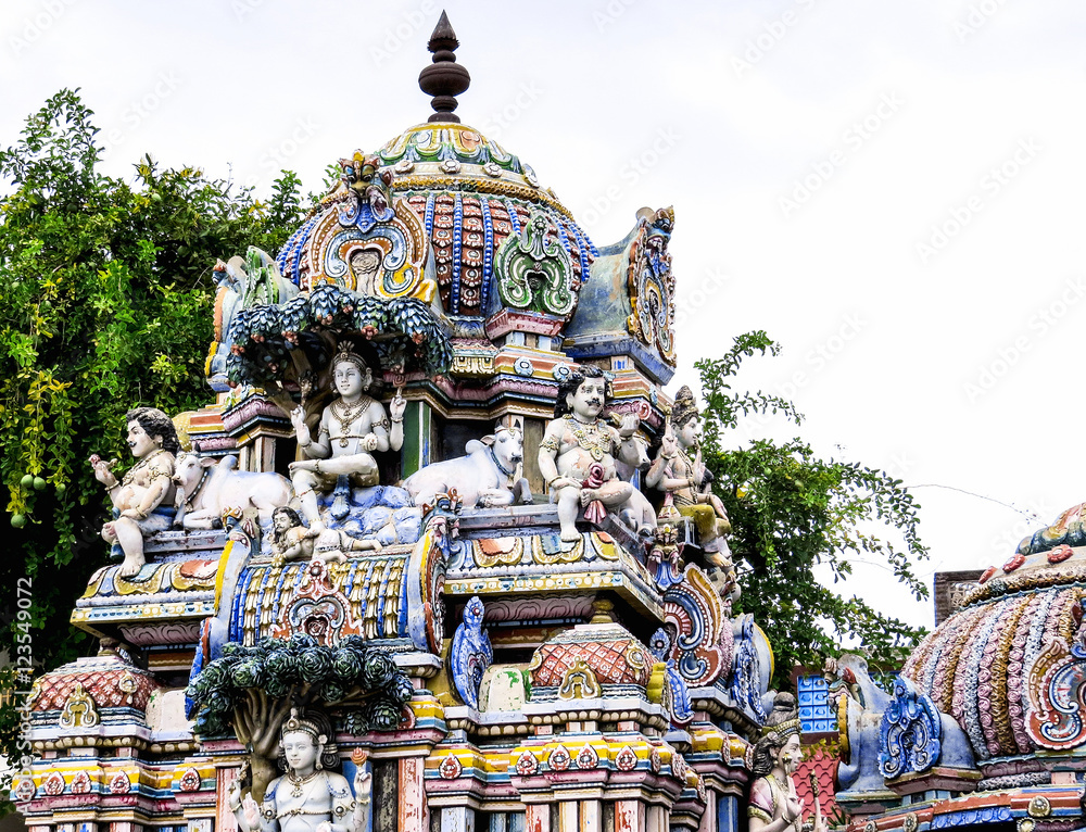 Statues of Lord Shiva and other mythological creatures on one of the Gopuram ancient Shiva temple of the 18th century, Pondicherry, South India