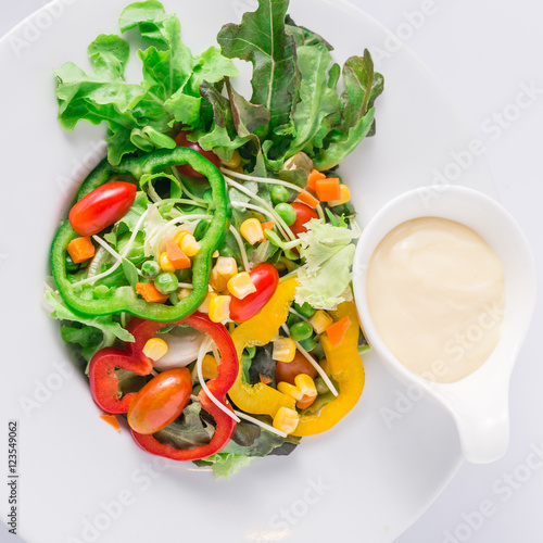 Fresh organic vegetable salad  on white dish.