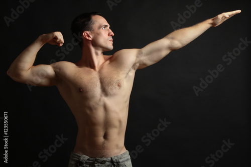 Muscular male torso. Perfect fit, shoulders, deltoids, biceps, triceps and chest. 