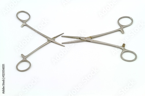 Surgical instrument (hemostat or artery clamp ) on white background 