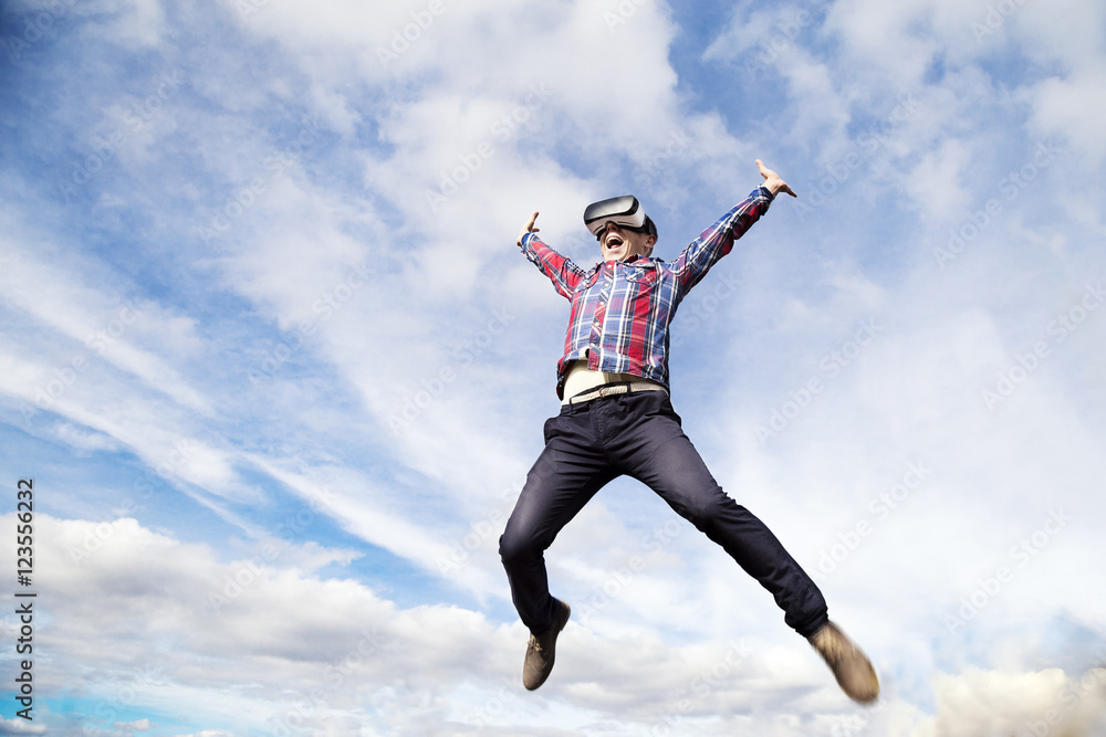 Young man in virtual reality, vr glasses. Young man in virtual reality, vr glasses.