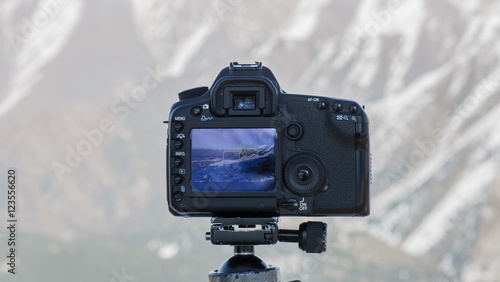 the camera photographs the mountain