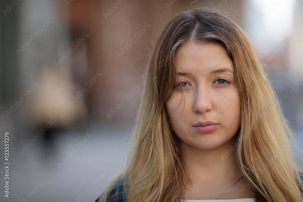 Young woman in city sad face Young woman in city sad face