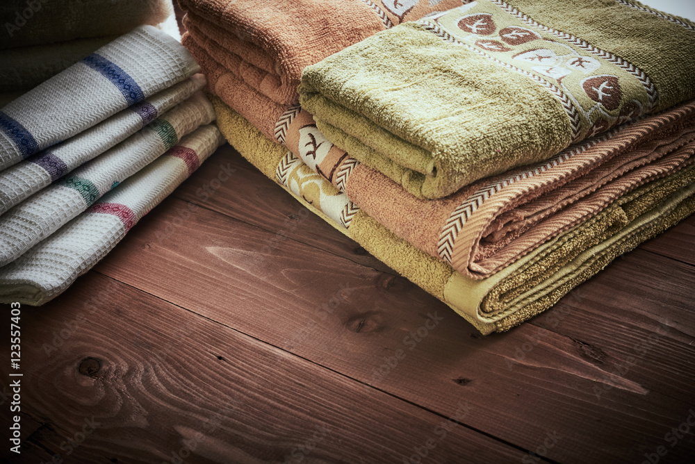 many stacked a pile of towels many stacked a pile of towels