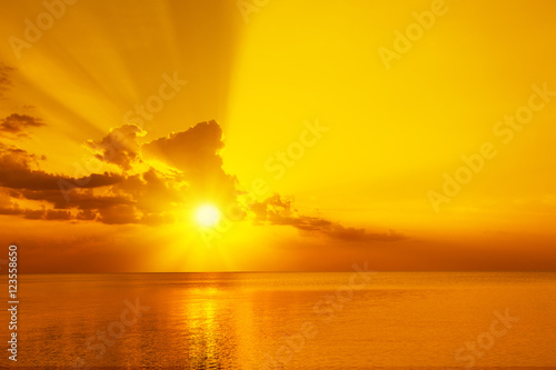 Magic golden sunset over sea © vvvita