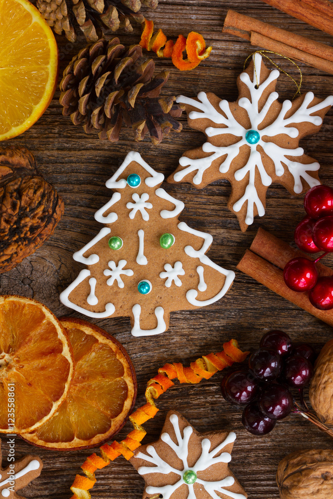 christmas gingerbread tree cookie with spices and decorations close up christmas gingerbread tree cookie with spices and decorations close up